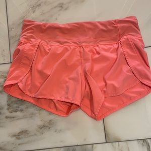 Coral Lululemon Run times 4” shorts